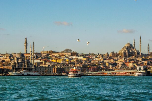 city buildings near body of water during daytime