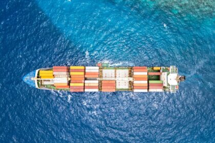 An aerial view of a cargo ship in the ocean